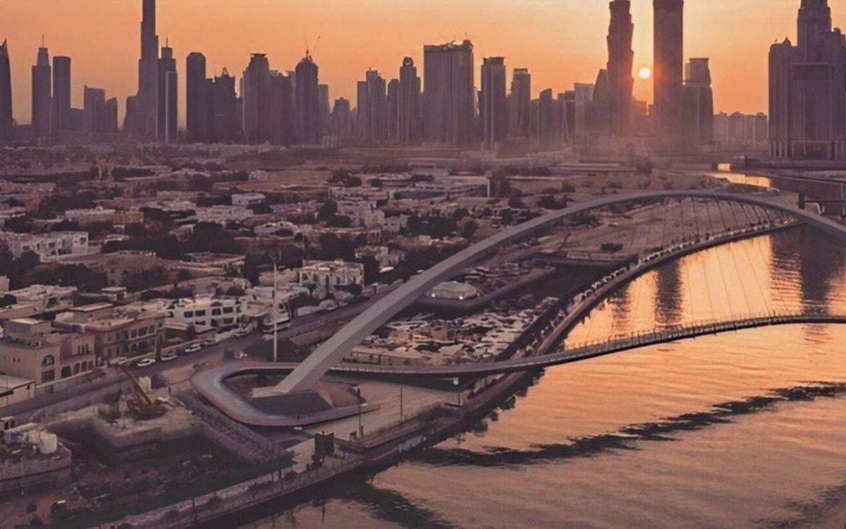 Dubai Water Canal and the Downtown Dubai skyline at sunset